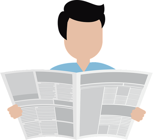 Mann liesst eine Zeitung